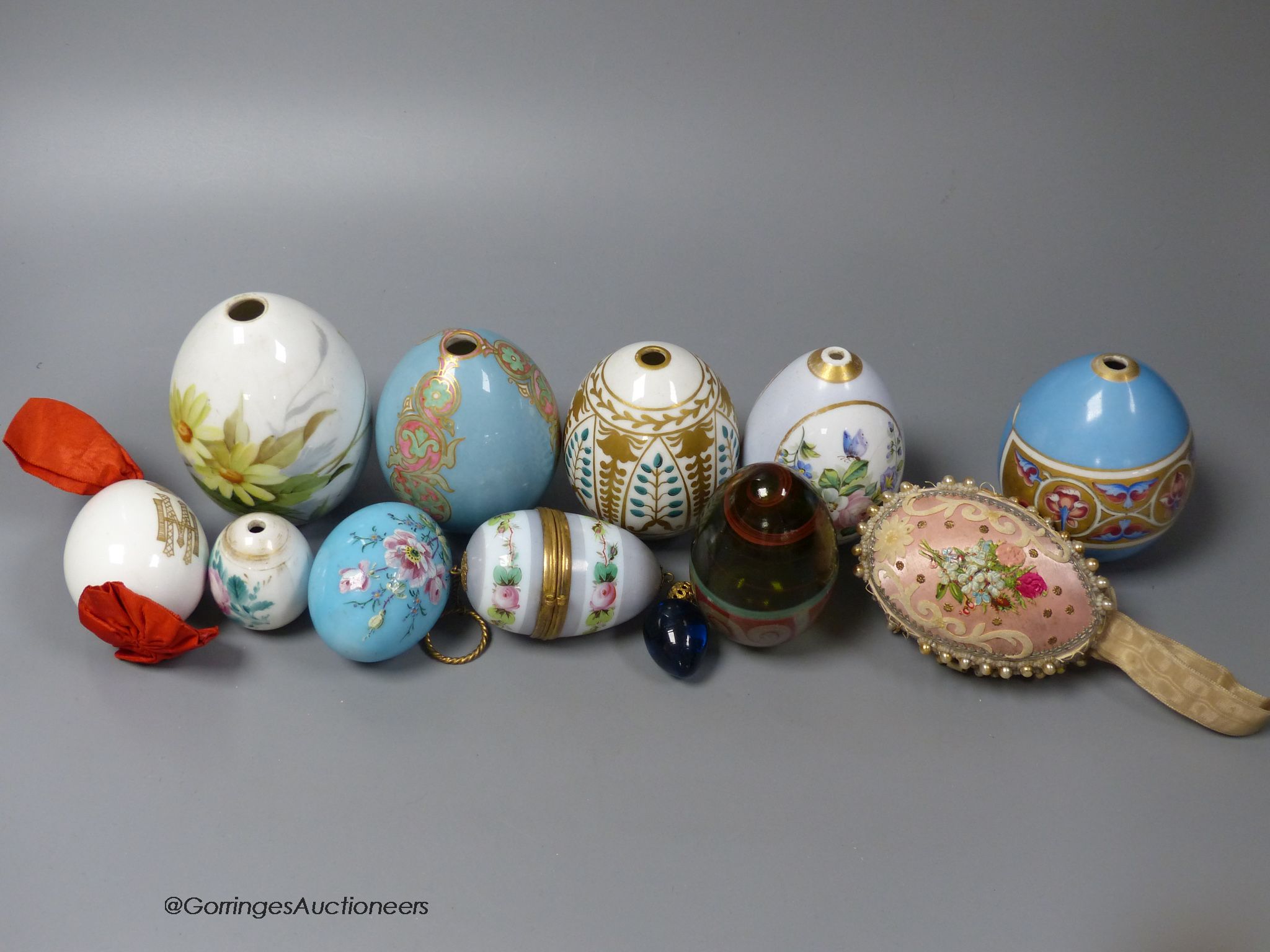 Assorted 19th/20th century Russian painted and gilded porcelain Easter eggs